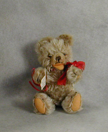 Herman Zotty Bear with red ribbon