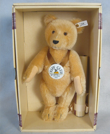 Blond bear with ceramic medallion