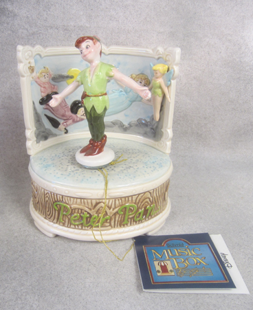 Ceramic Peter Pan music box with tag