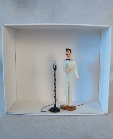 Pixi figurine of singer with microphone