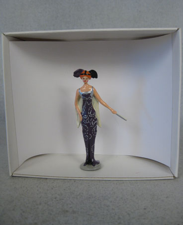 Pixi figurine of model wearing Worth design