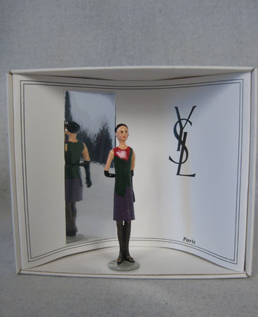 Pixi figurine of model wearing Yves St. Laurent design