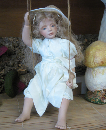 Caemilla Doll on Swing