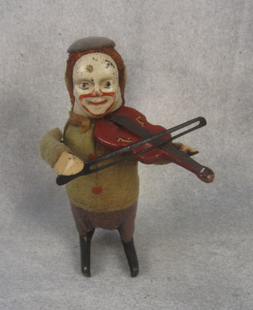 Clockwork clown playing a violin