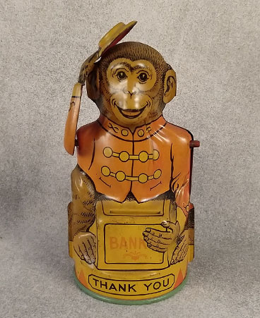 Mechanical tin monkey bank