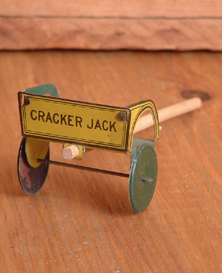 Yellow and brown Cracker Jack cart