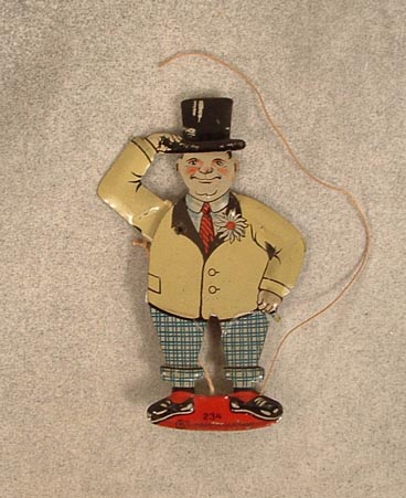 Tin gentleman tipping hat