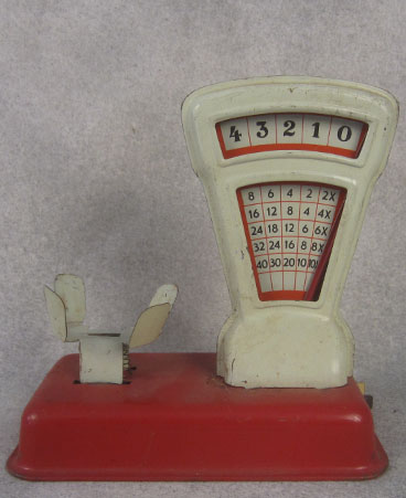 Tin toy grocery scale